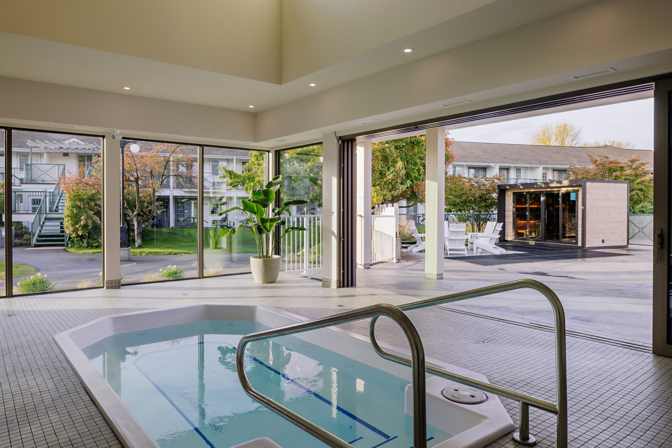 Indoor/outdoor hot tub and cold plunge at the Balcomo Salt Spa